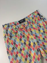 Load image into Gallery viewer, Vintage Versace 90s rave multi coloured harlequin check denim Jeans
